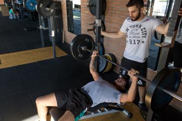 Men lifting at the gym