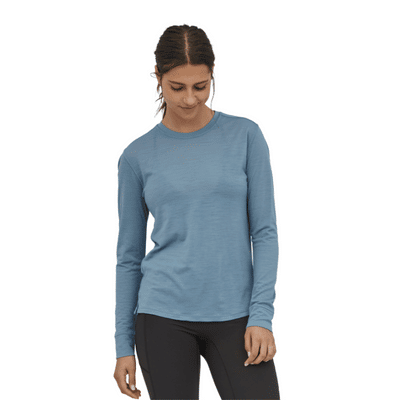 Woman in a blue Merino wool shirt