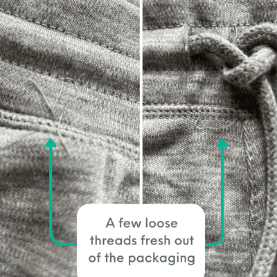 Loose gray threads around waistband on Woolly Merino Wool shorts